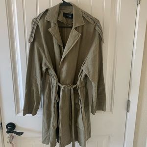 Green coat with a bit of sparkle.